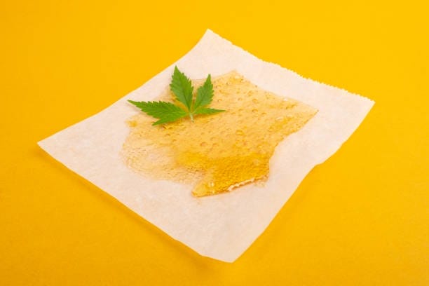 marijuana resin concentrate, yellow amber color cannabis wax